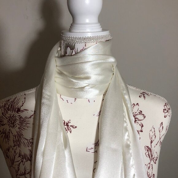 Elevate Your Elegance: The Pristine Satin Fringe Scarf - Picture 2 of 14